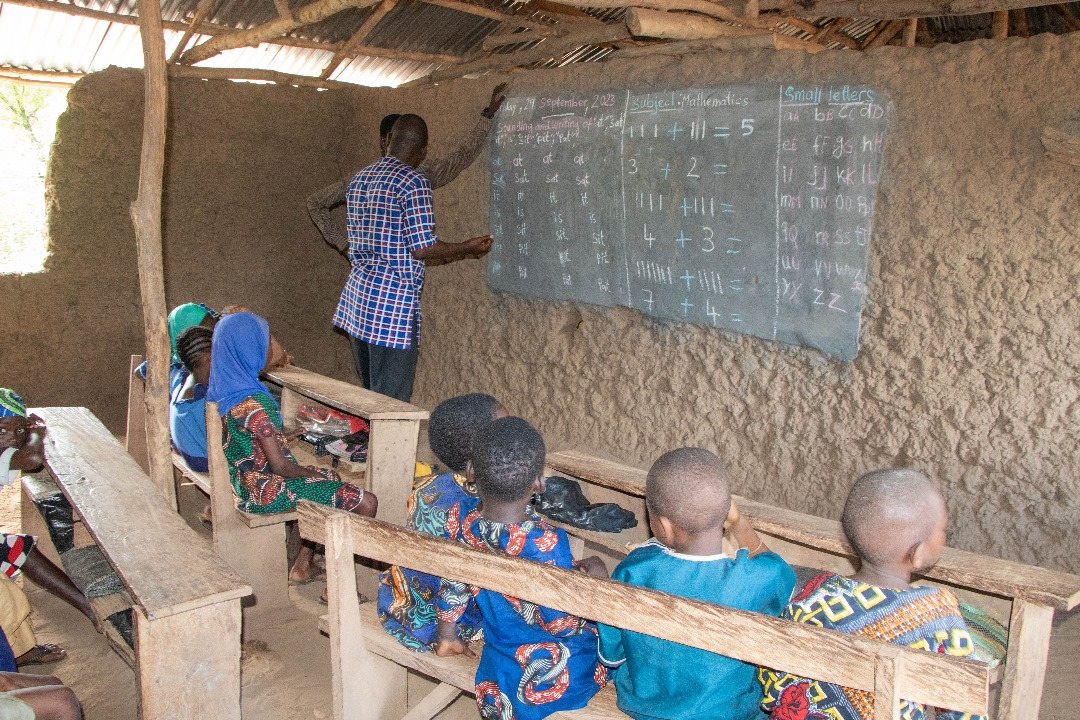 Children in class at one of Phynai's community schools
